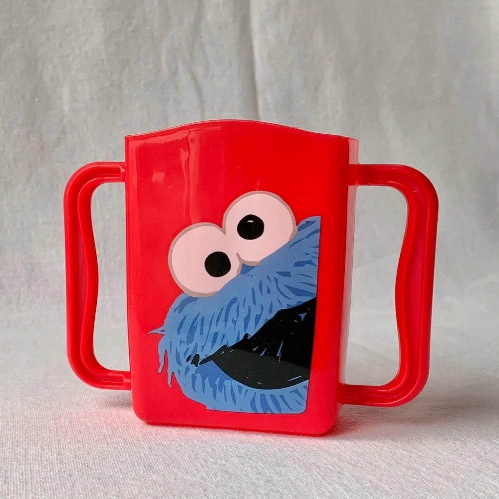 2013 Sesame Street Cookie Monster Kids Red Plastic Juice Box Holder with Handles
